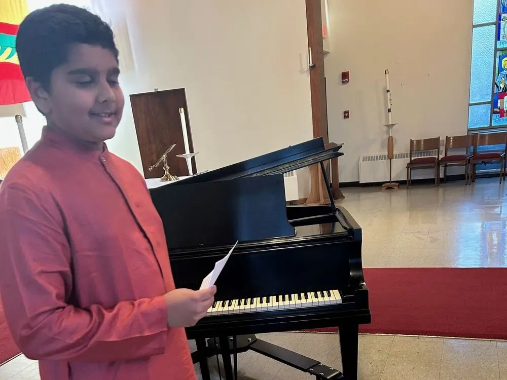 Presenting with poise during the Allegro Diwali celebration.
